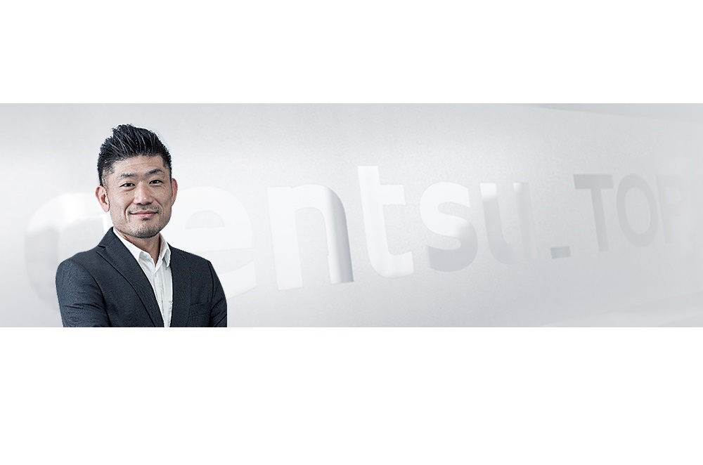 СʿTsuyoshi Komuroεͨɹ޹˾CEO