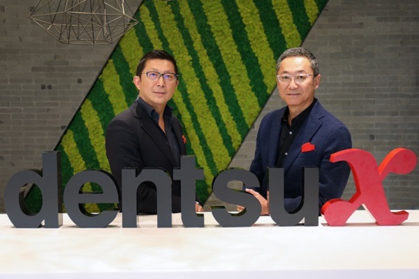 dentsu Xйгģ